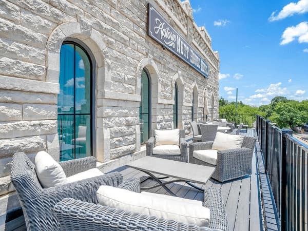 Outdoor Balcony with seating at the Nut House Hotel